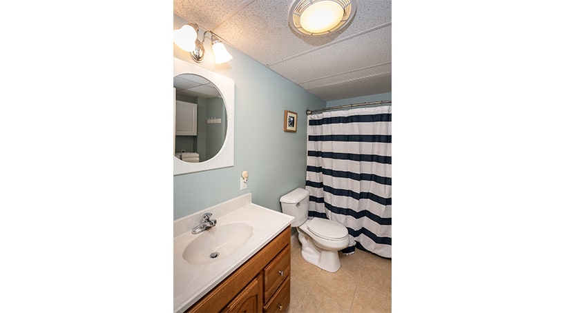 Specious Bathroom - Carriage House at One Long Beach